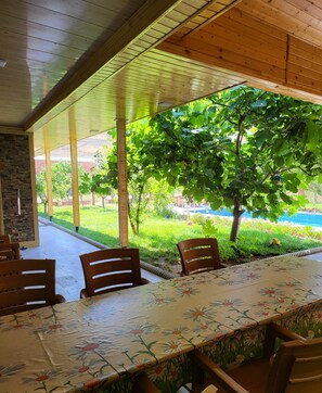 Outdoor dining - Peaceful Stay in Shabran at Pearl Oasis (Shabran)