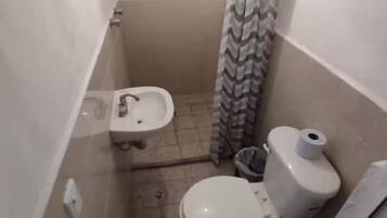 Shower, towels, soap, toilet paper