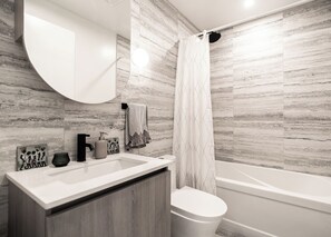 Hair dryer, towels, soap, toilet paper