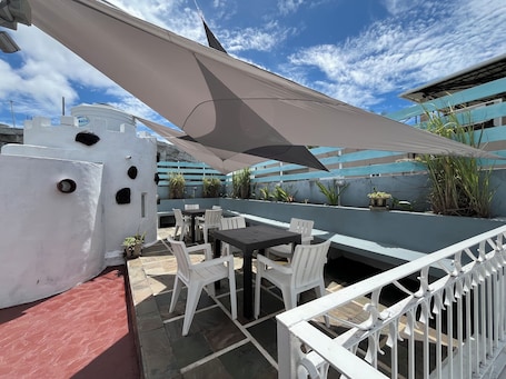 Outdoor dining. Lafrik - Two-Bedroom Apartment