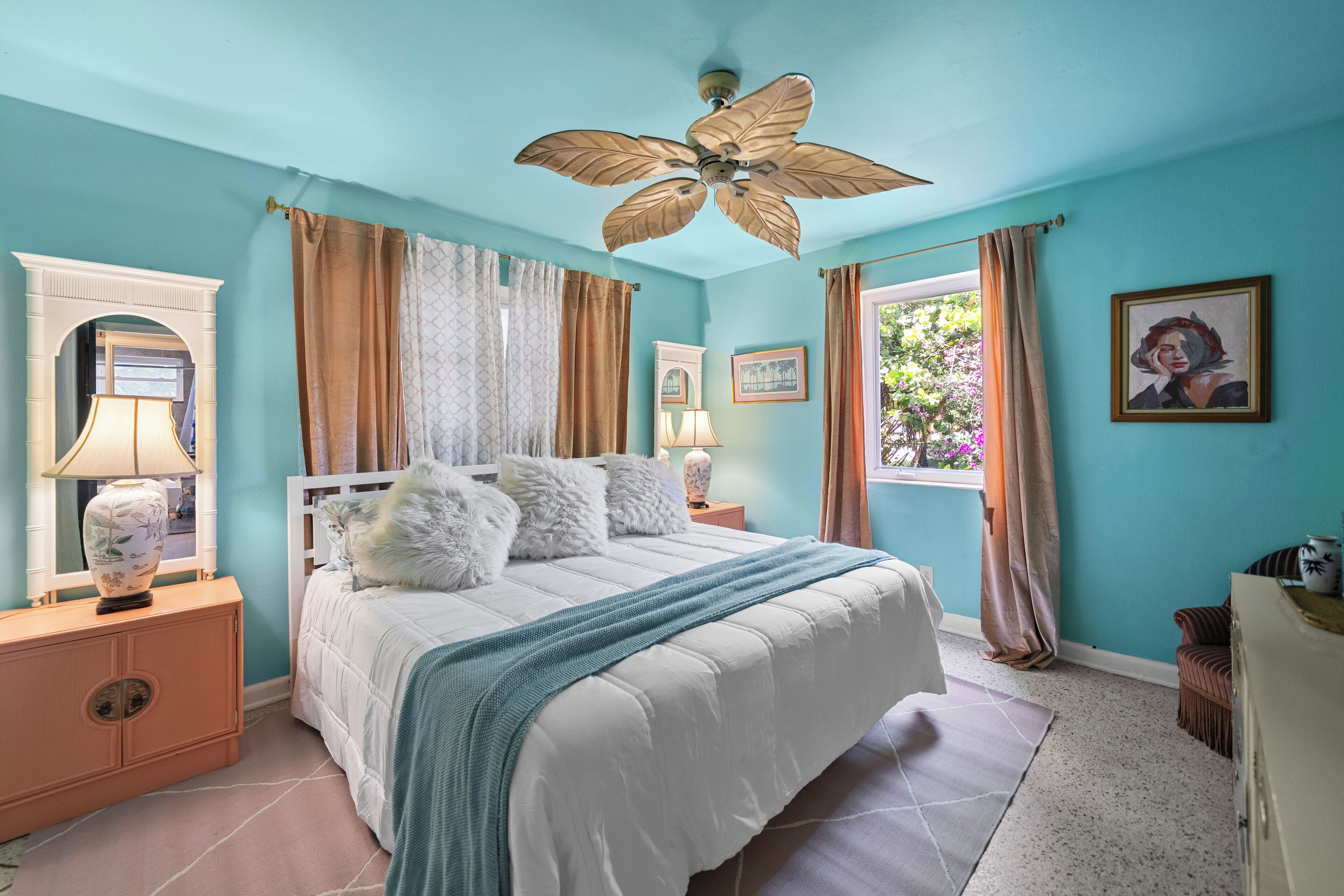 King sized bedroom with smart TV. 