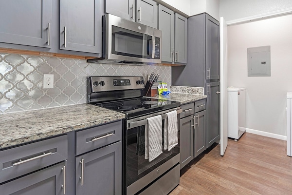 Appartement, 2 chambres | Cuisine privée | Grand réfrigérateur, micro-ondes, plaque de cuisson, lave-vaisselle