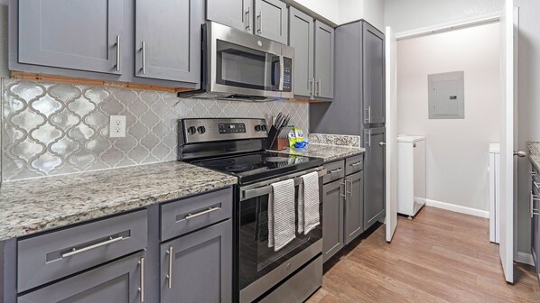Apartment, 2 Bedrooms | Private kitchen | Full-size fridge, microwave, stovetop, dishwasher
