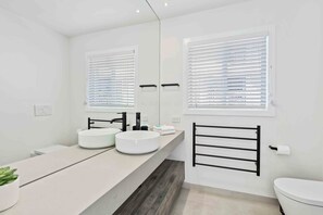 Hair dryer, towels, soap, shampoo