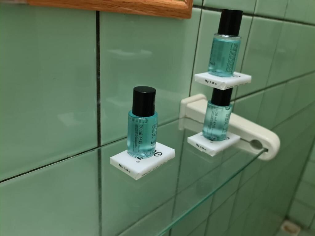 Shower, towels, soap, toilet paper