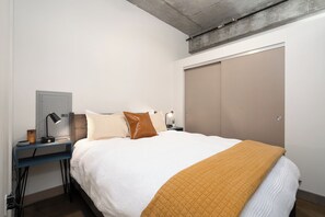 1 bedroom, laptop workspace, bed sheets