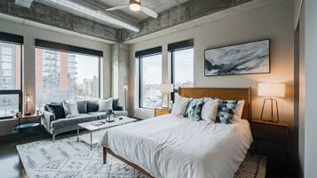 Apartment (0 Bedroom) | Laptop workspace, bed sheets