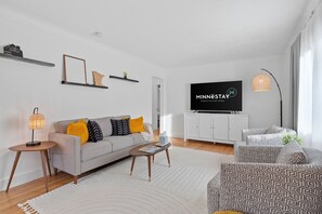 House (3 Bedrooms) | Living room | TV, fireplace, foosball, table tennis