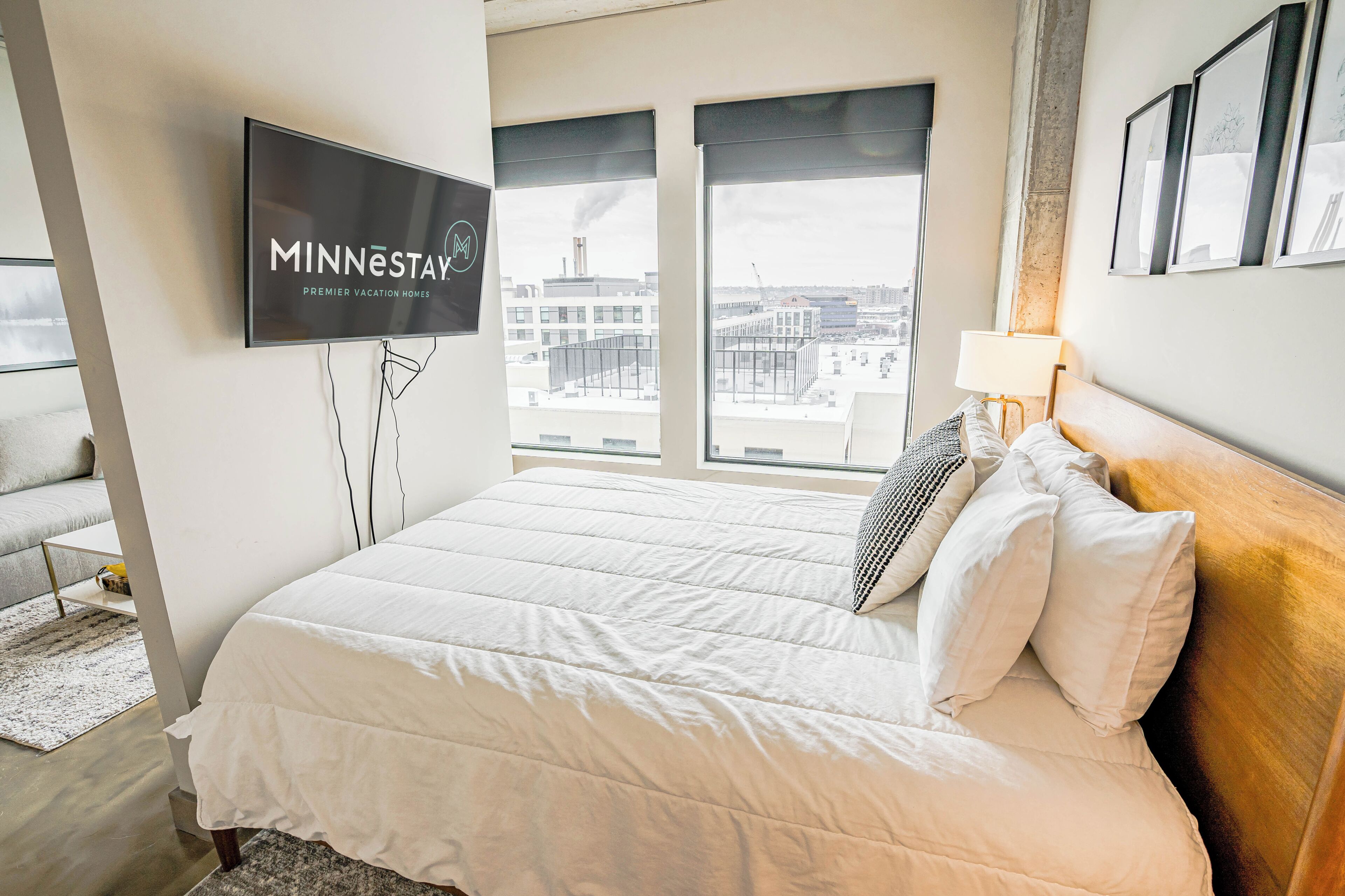 Laptop workspace, bed sheets