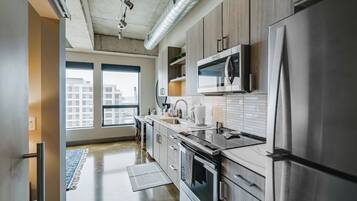 Apartment (1 Bedroom) | Private kitchen | Microwave, oven, stovetop, dishwasher