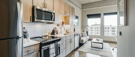 Apartment (0 Bedroom) | Private kitchen | Microwave, oven, stovetop, dishwasher