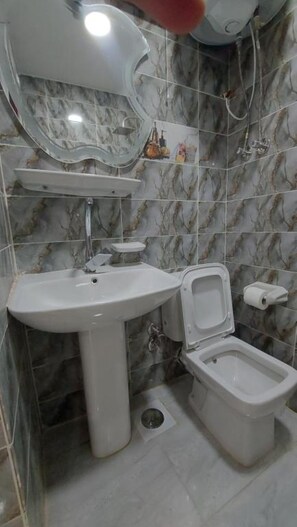 Hair dryer, towels, toilet paper