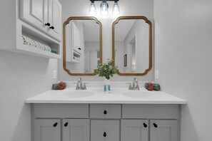 Shower, hair dryer, towels, toilet paper