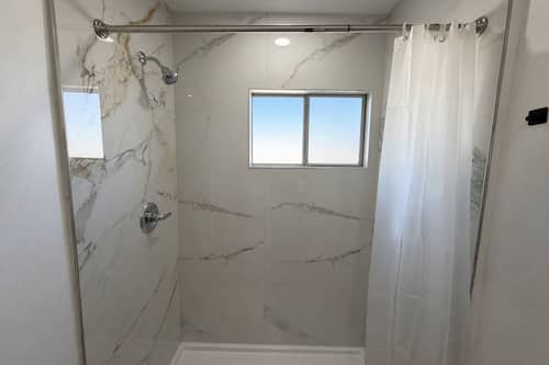 Deluxe Quadruple Room, 2 Double Beds | Bathroom