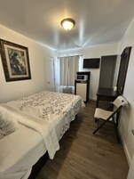 Deluxe Room, 1 Queen Bed, Non Smoking | Desk, laptop workspace, free WiFi, bed sheets