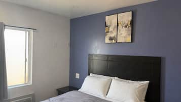 Desk, laptop workspace, free WiFi, bed sheets