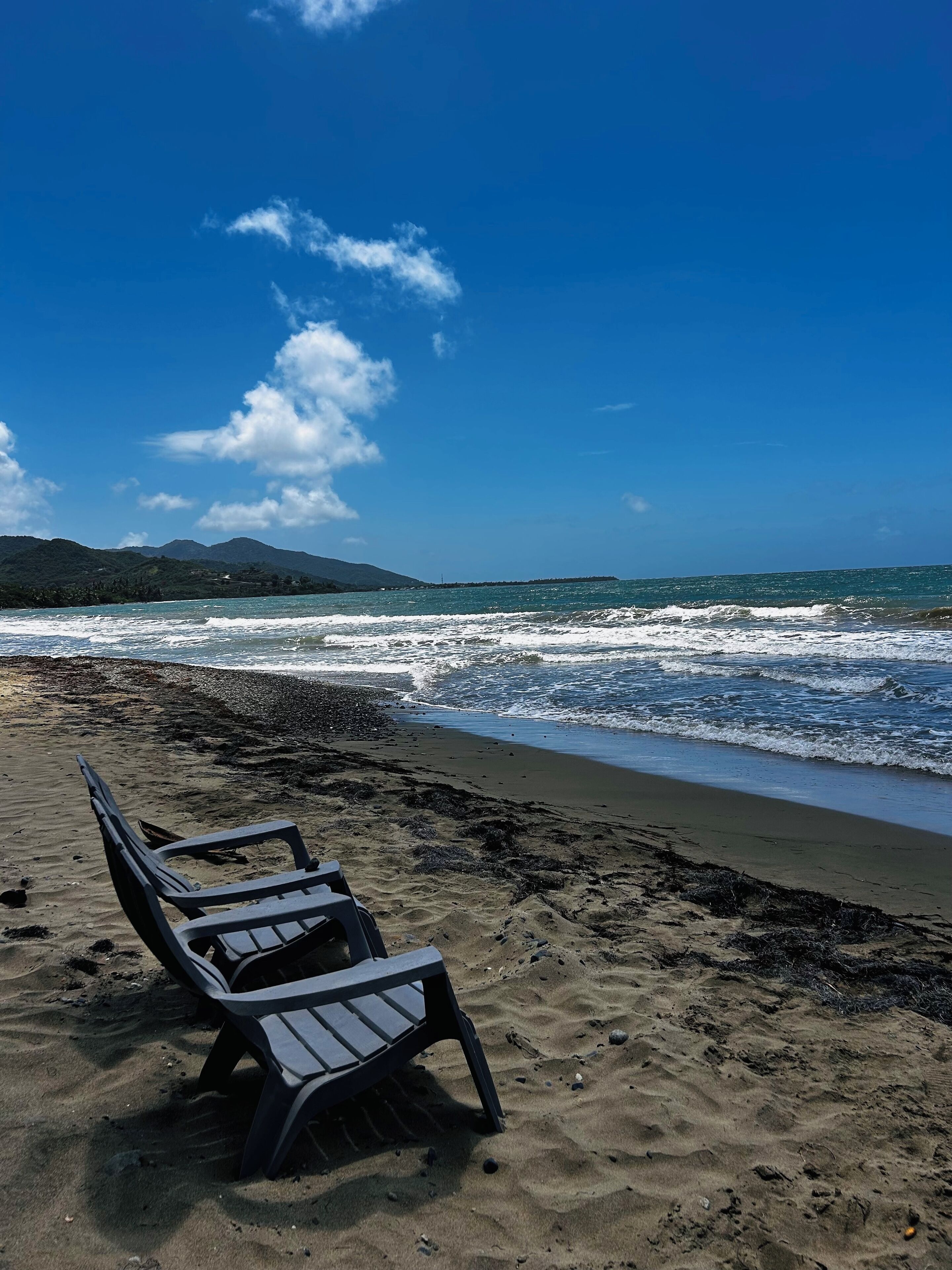 On the beach, sun loungers, beach towels