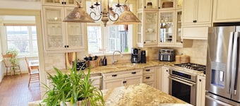 Bright & Airy Beach House – Bay Views, Wraparound Deck & Room to Unwind