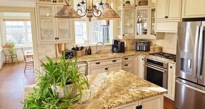Bright & Airy Beach House – Bay Views, Wraparound Deck & Room to Unwind