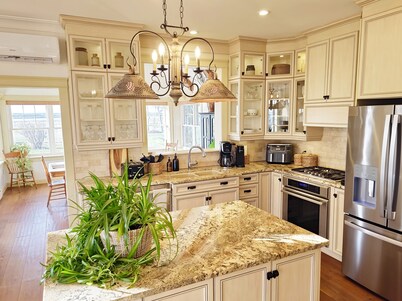 Bright & Airy Beach House – Bay Views, Wraparound Deck & Room to Unwind