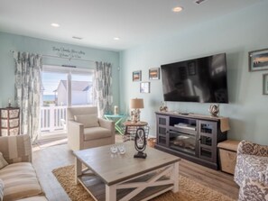 Smart TV, fireplace, books