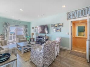 Smart TV, fireplace, books