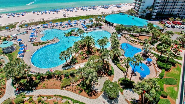A resort with multiple swimming pools, a beach, and a hotel building. - Luxe Gulf-front Free Beach Chairs Balcony View Resort Amenities ON THE Beach (Panama City Beach)