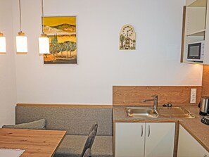 Fridge, microwave, cookware/dishes/utensils