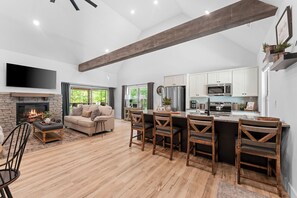 Smart TV, fireplace, books