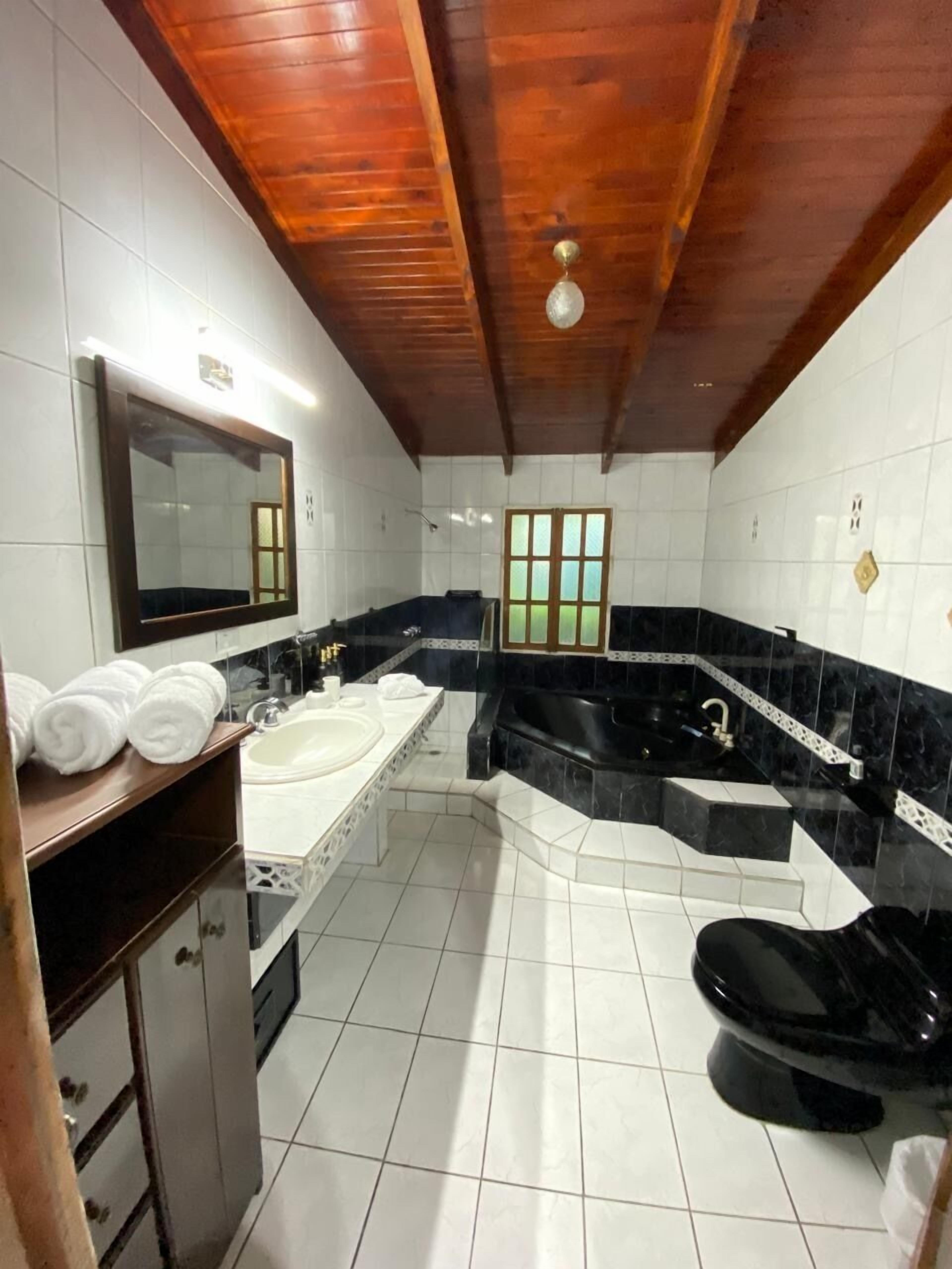 Shower, towels, soap, toilet paper