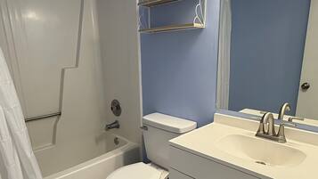 Hair dryer, towels, soap, shampoo