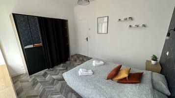 1 chambre, fer et planche à repasser, Wi-Fi gratuit, draps fournis