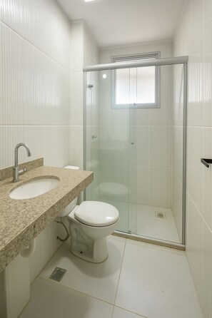 Bidet, towels, toilet paper