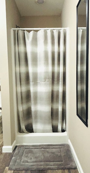 Shower, towels, soap, toilet paper