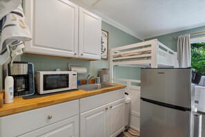 Fridge, microwave, coffee/tea maker, toaster