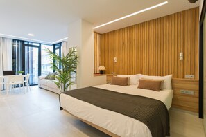 Desk, iron/ironing board, travel crib