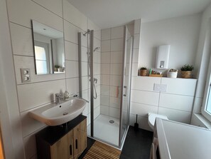 Hair dryer, towels, soap, toilet paper
