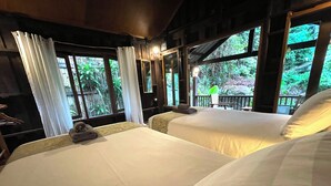 A room with two beds, large windows, and a view of greenery outside. - Tropical jungle escape just 5mins from Lamai beach (Chang Wat Surat Thani)