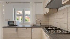 Fridge, microwave, coffee/tea maker, toaster