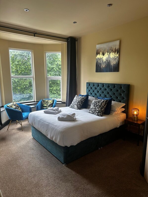 Habitación Deluxe, vista a la bahía | Ropa de cama de alta calidad y camas con efecto memoria 