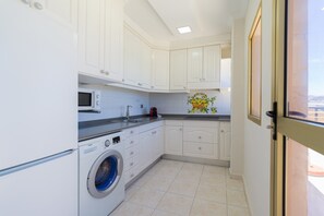 Microwave, stovetop, coffee/tea maker, toaster