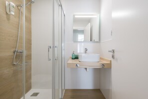 Shower, hair dryer, shampoo