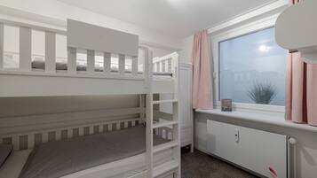 2 chambres, coffres-forts dans les chambres, fer et planche Ă repasser