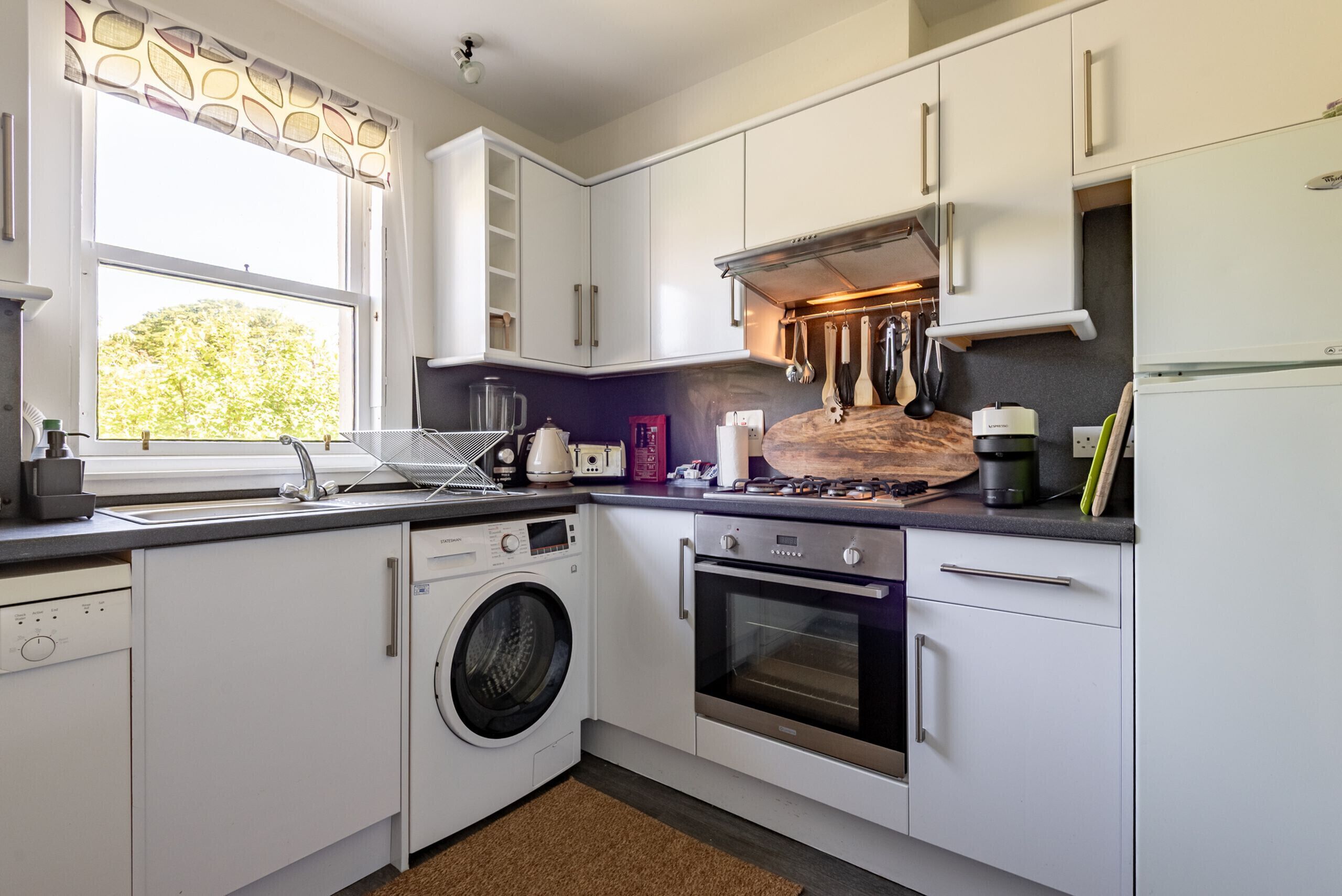 Coffee/tea maker, fridge, microwave, oven