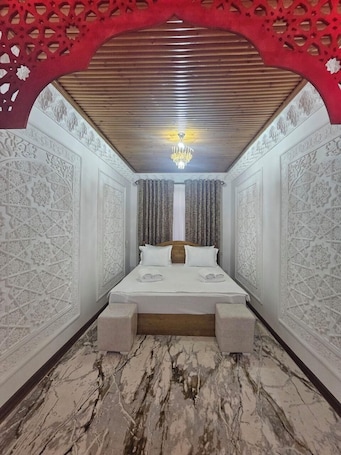 Deluxe Room, Patio, City View | In-room safe, soundproofing, iron/ironing board