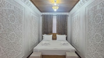 Egyptian cotton sheets, premium bedding, in-room safe, desk