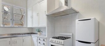 Escape to this sun-kissed double bedrooms Mount Eden mountain view house