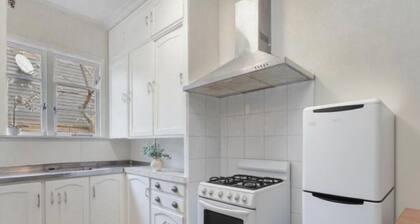 Escape to this sun-kissed double bedrooms Mount Eden mountain view house