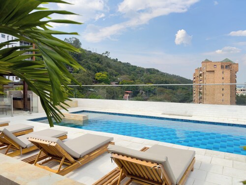 Modern, Bright, Quiet Apartment in Granada: A/C, Pool, Desk & Balcony