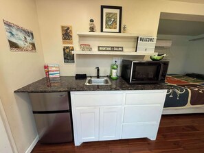 Fridge, microwave, coffee/tea maker, toaster
